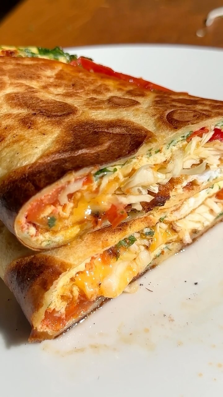 Delicious Breakfast Egg Wrap with Cheddar Cheese, Tomato, and Fresh Parsley